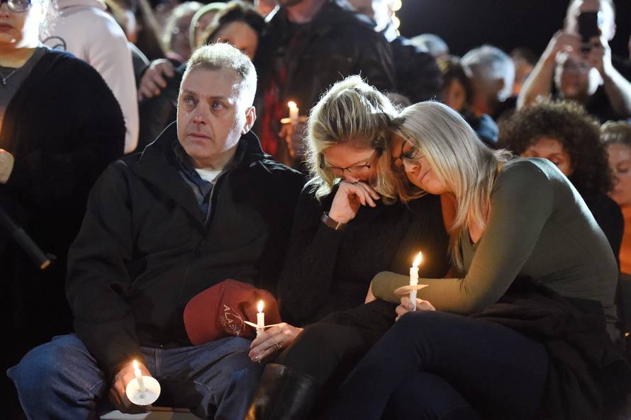 Jill Richardson Perez mother of Matt Coons mourns the loss of her son during a candle-light vigil for the victims of a limousine accident in Amsterdam New York