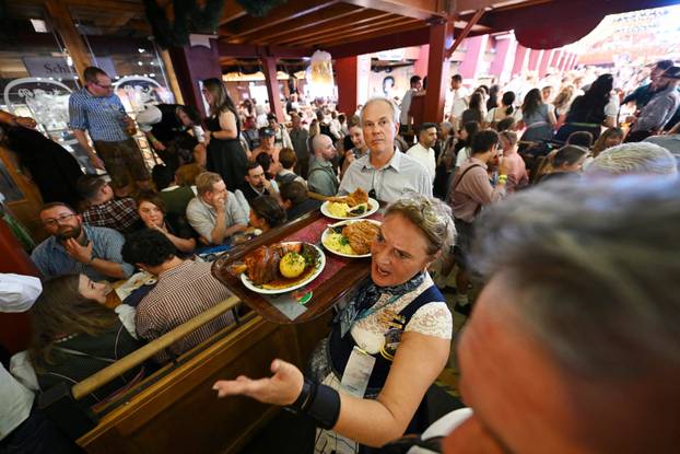 Hamburg office worker annually trades her desk for Oktoberfest waitressing