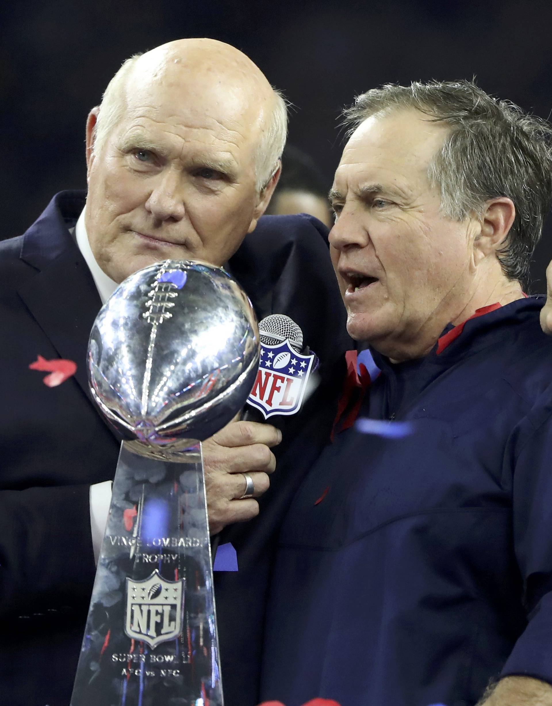 New England Patriots' head coach Belichick is interviewed by broadcaster Bradshaw next to the Vince Lombardi trophy after the Patriots defeated the Atlanta Falcons to win Super Bowl LI in Houston