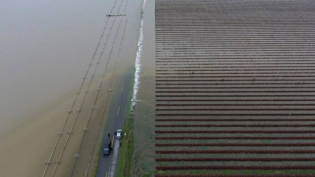 Floodwaters trigger evacuations and highway closures in British Columbia’s Fraser Valley