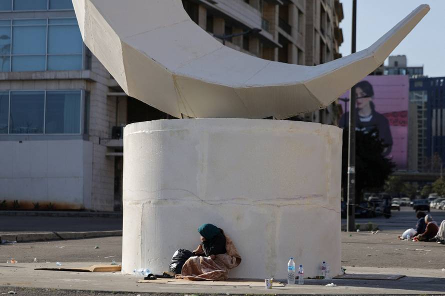 Displaced people from the southern suburbs, gather at Martyrs' Square in Beirut