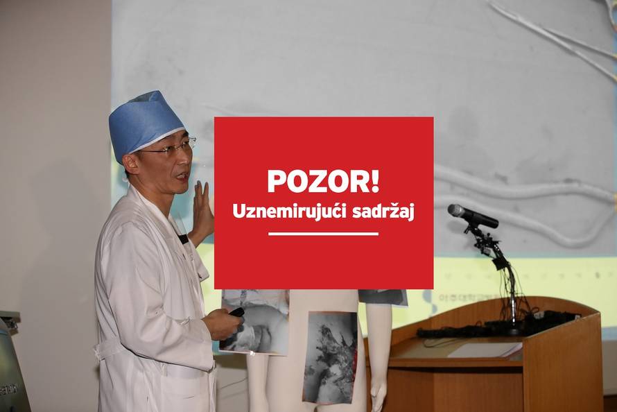 A surgeon Lee Cook-jong gives a briefing during a news conference at a hospital in Suwon