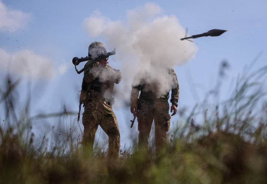 Ukrainian servicemen attend a training between combat missions at a training ground in Kharkiv region