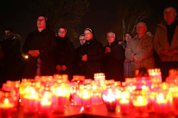 Bosnian Catholic nuns pray and light candles for the convicted general Slobodan Praljak, who killed himself seconds after the verdict in the U.N. war crimes tribunal in The Hague, in Mostar