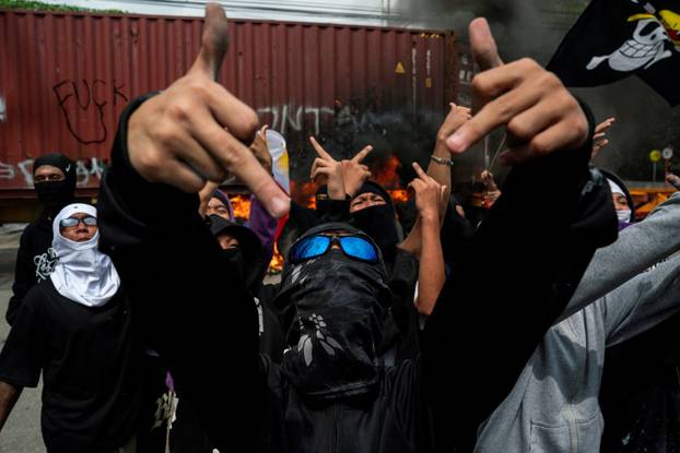 Filipinos protest to denounce what they say is corruption linked to flood control projects, in Manila