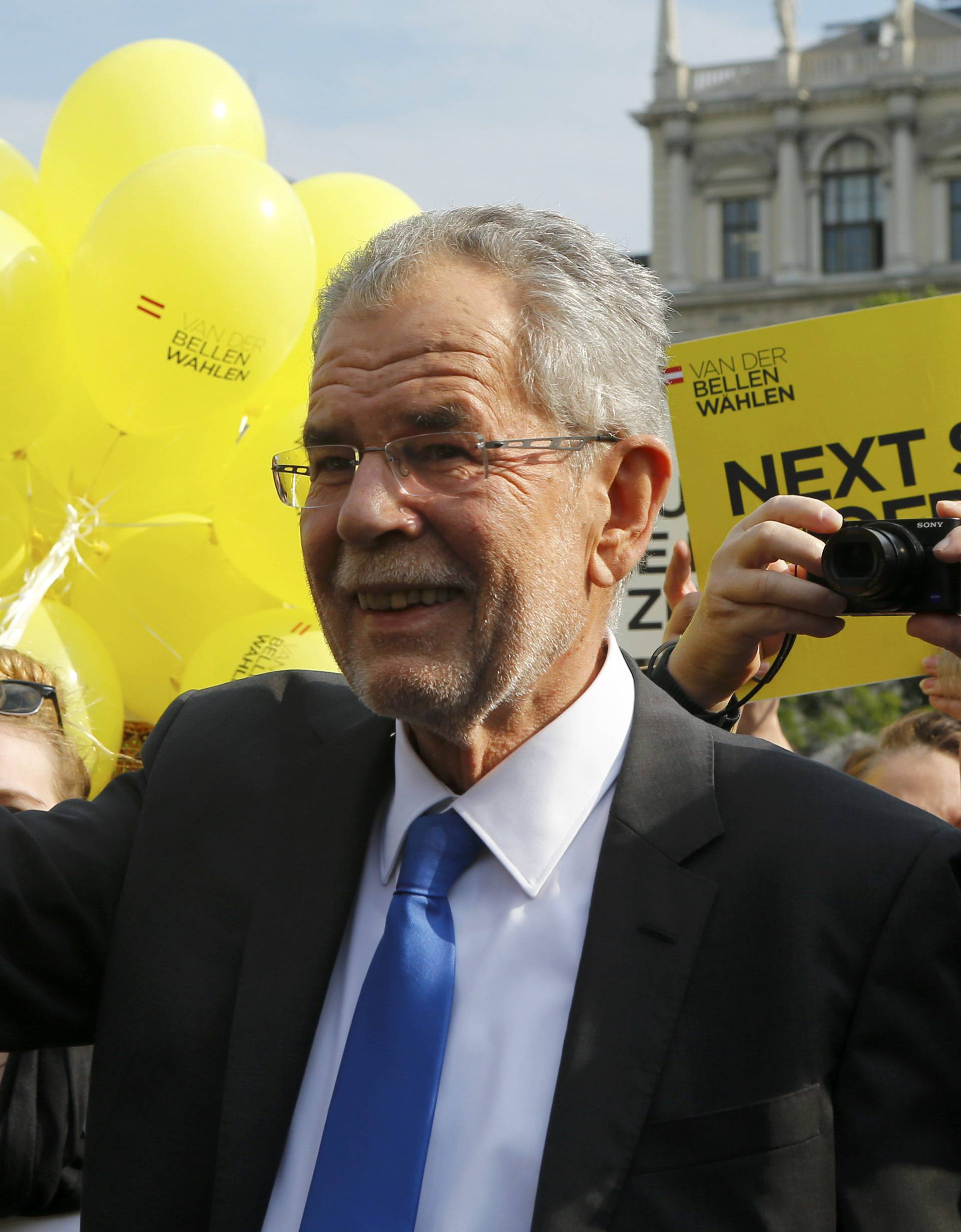 Van der Bellen who is supported by the Greens party arrives for his final election rally ahead of Austrian presidential election in Vienna