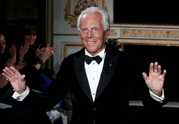 FILE PHOTO: Italian designer Giorgio Armani appears at the end of his Haute Couture Spring-Summer 2019 collection show for fashion house Giorgio Armani Prive in Paris