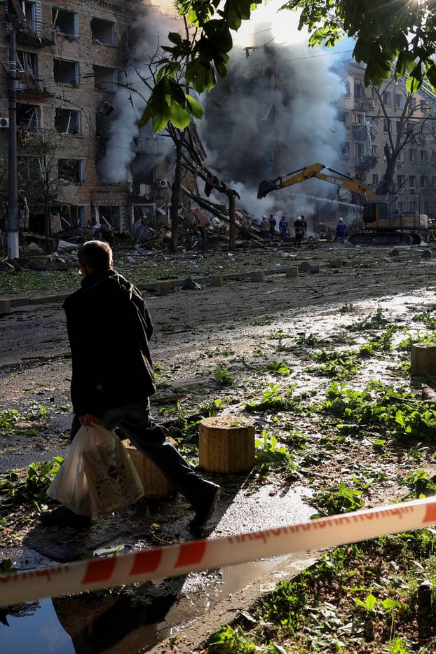 Site of an apartment building damaged during a Russian missile and drone strike, amid Russia's attack on Ukraine, in Kyiv
