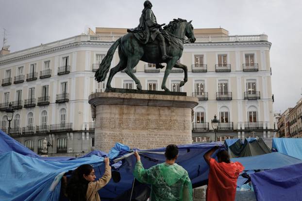 Demonstrators camp in Puerta del Sol square in Madrid