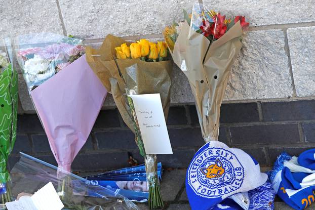 Messages and flowers can be seen placed outside Leicester City football stadium after the helicopter of the club owner Thai businessman Vichai Srivaddhanaprabha crashed when leaving the ground on Saturday evening after the match, in Leicester