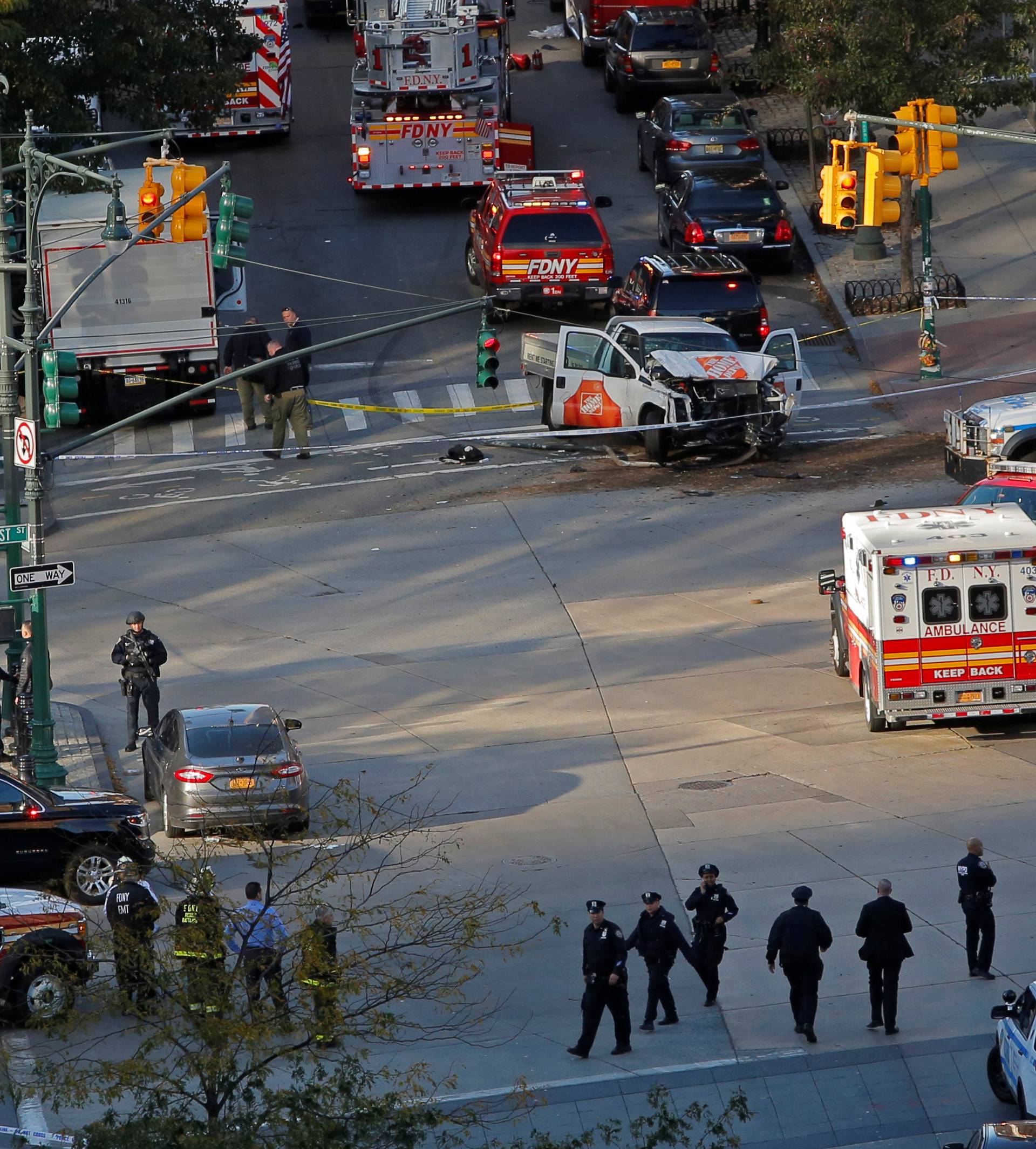 Emergency crews attend the scene of an alleged shooting incident on West Street in Manhattan, New York.