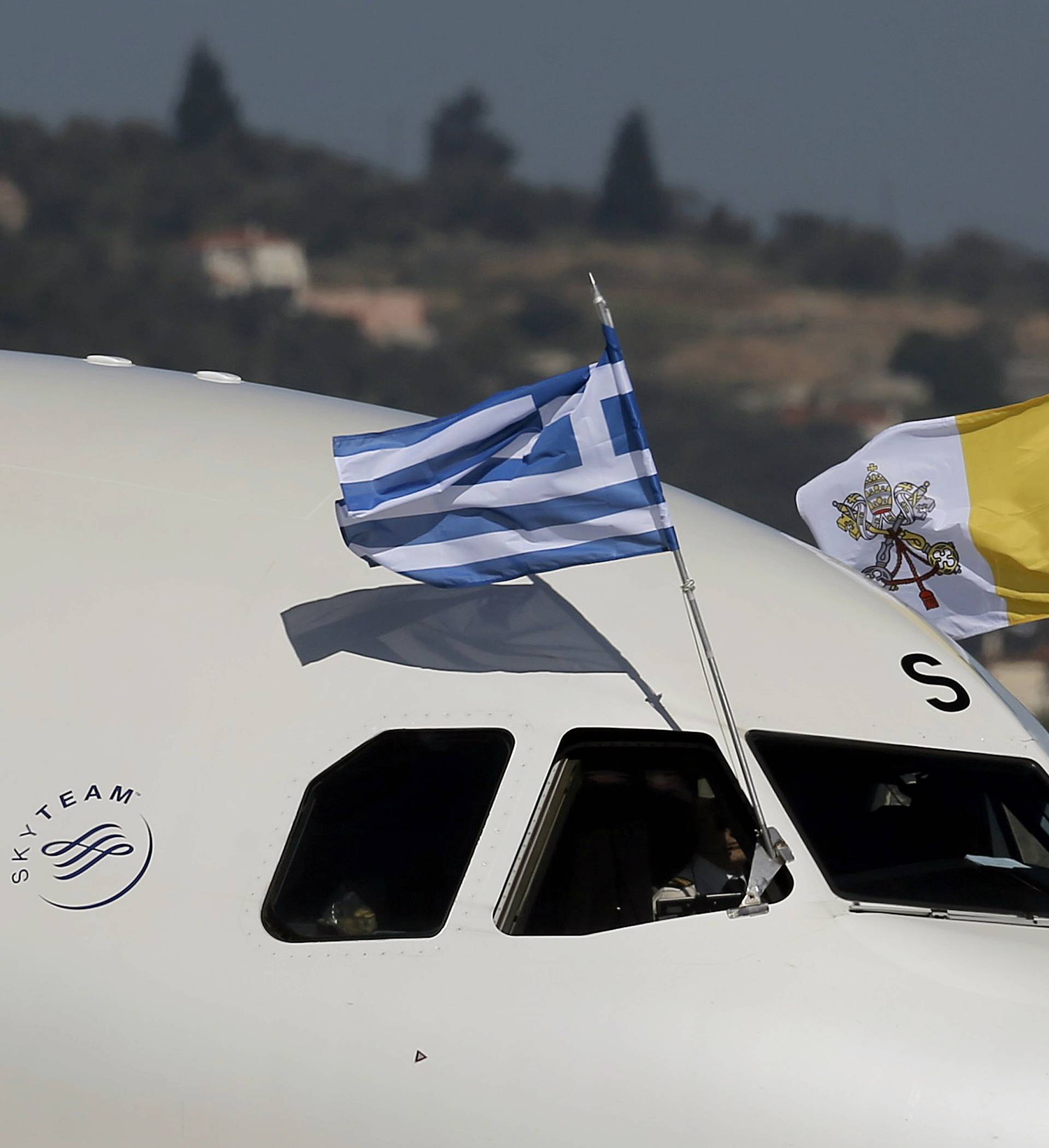 Plane carrying Pope Francis arrives on the Greek Island of Lesbos