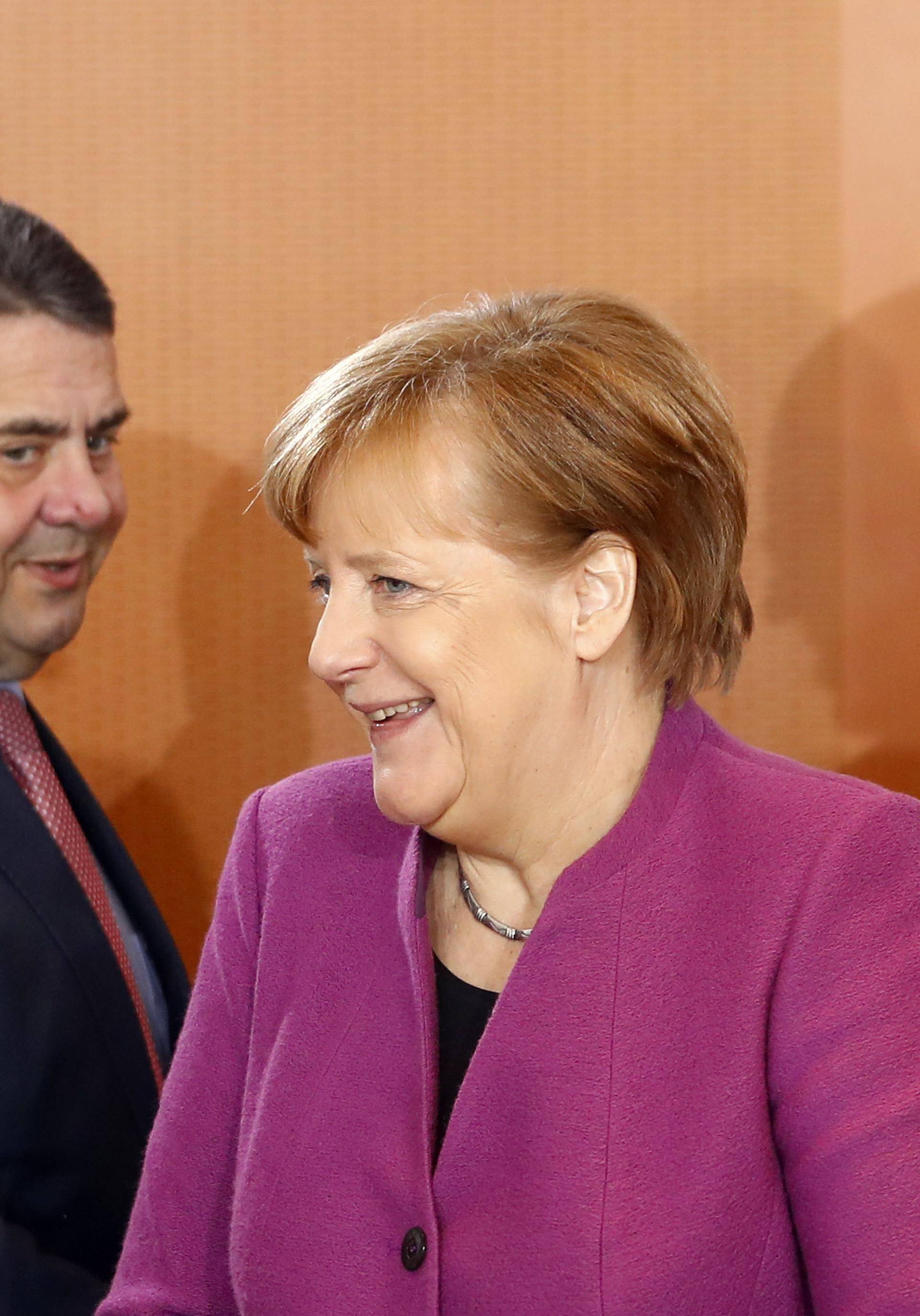 German Foreign Minister Sigmar Gabriel, Chancellor Angela Merkel and Chancellery minister Peter Altmaier attend the weekly cabinet meeting at the Chancellery in Berlin