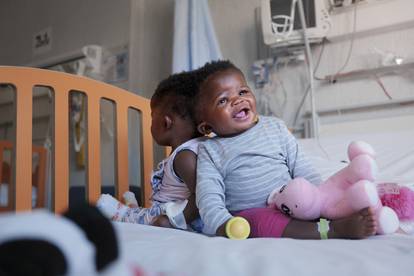 Two-year-old conjoined twins separated by Italian doctors in rare surgery in Rome