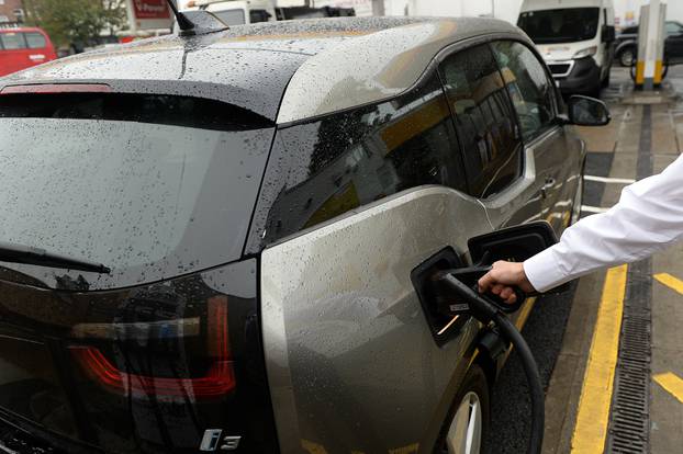 An electric car charges at the Holloway Road Shell station where Shell is launching its first fast electric vehicle charging station in London