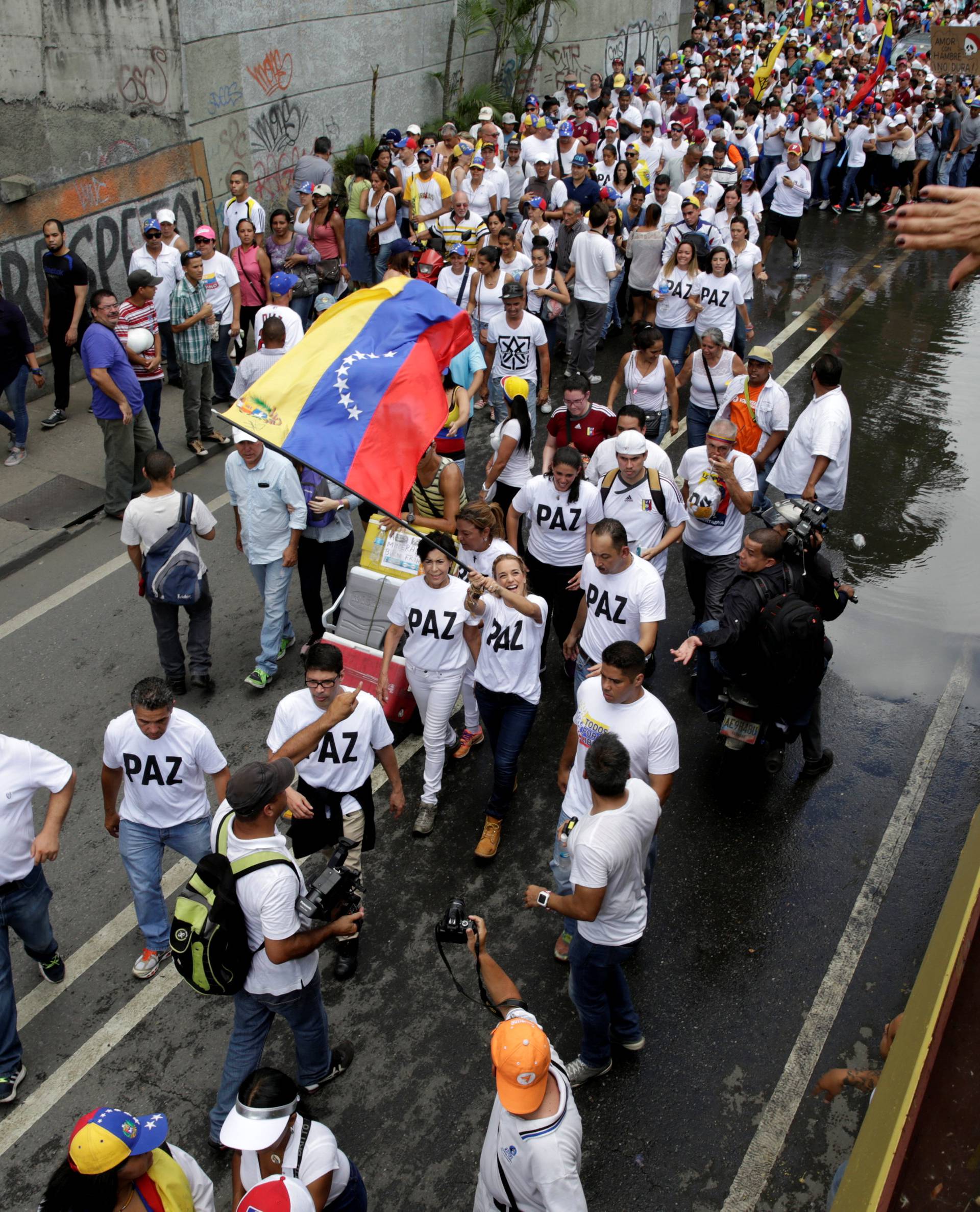 Lilian Tintori, wife of jailed Venezuelan opposition leader Leopoldo Lopez, takes part in a rally to demand a referendum to remove Venezuela's President Nicolas Maduro in Caracas