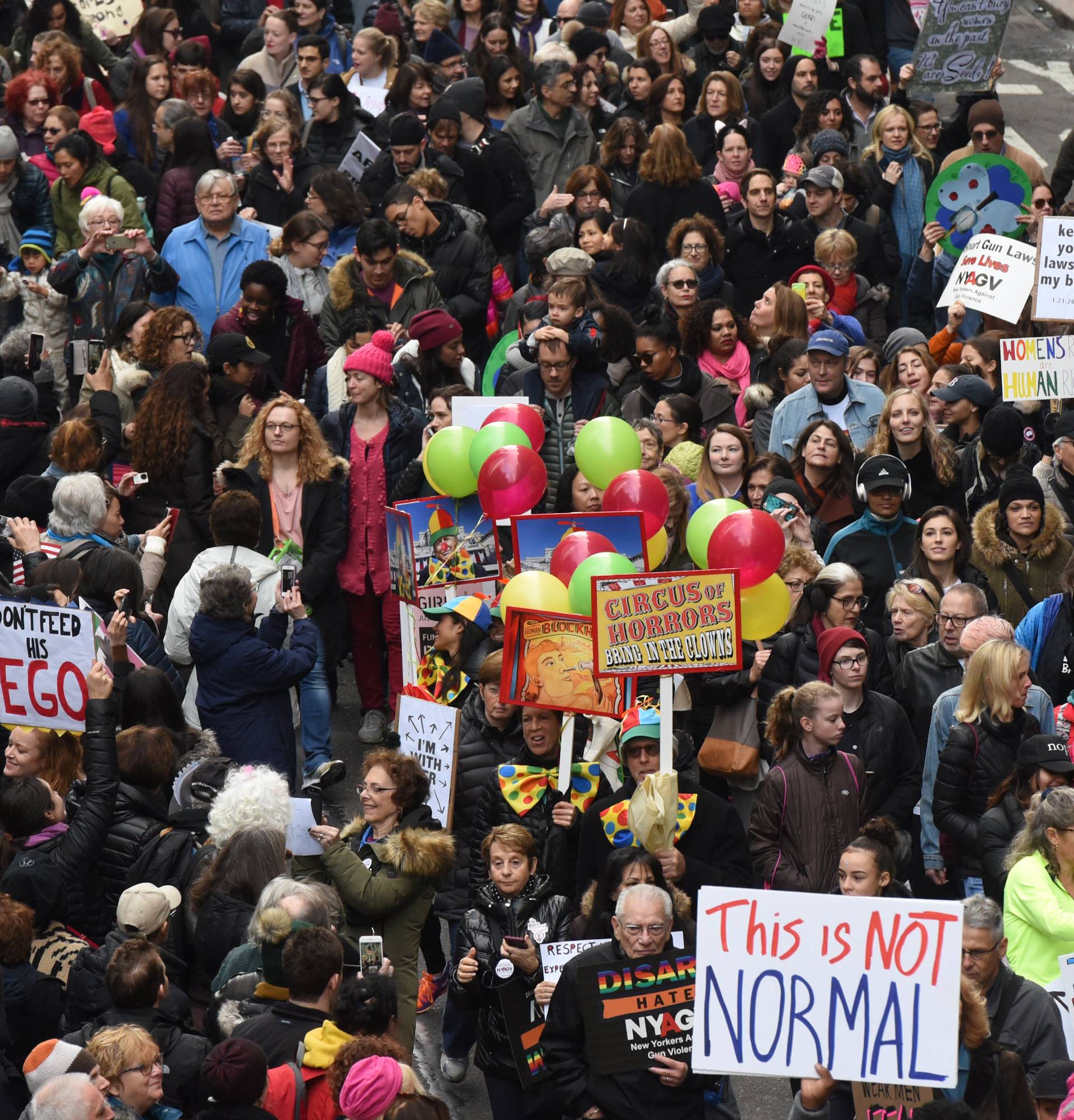 People participating in a Women's March to protest against U.S. President Donald Trump fill up 42nd St. in New York City