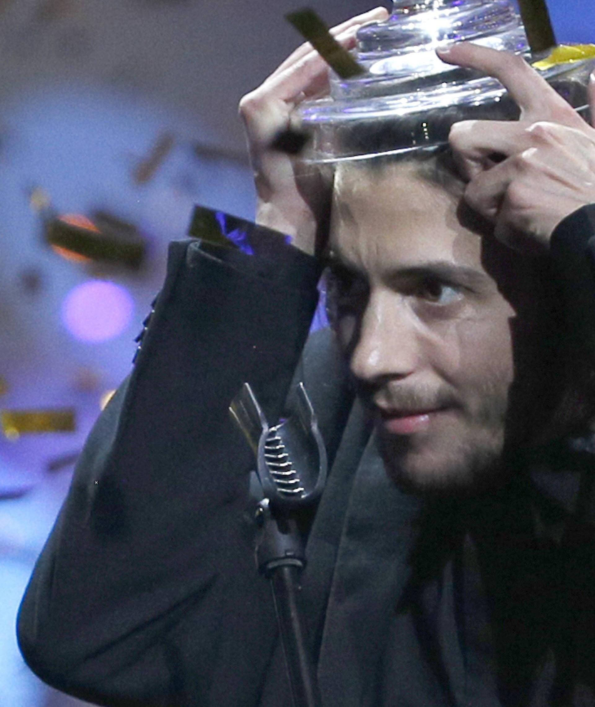 Portugal's Salvador Sobral celebrates after winning the grand final of the Eurovision Song Contest 2017 at the International Exhibition Centre in Kiev