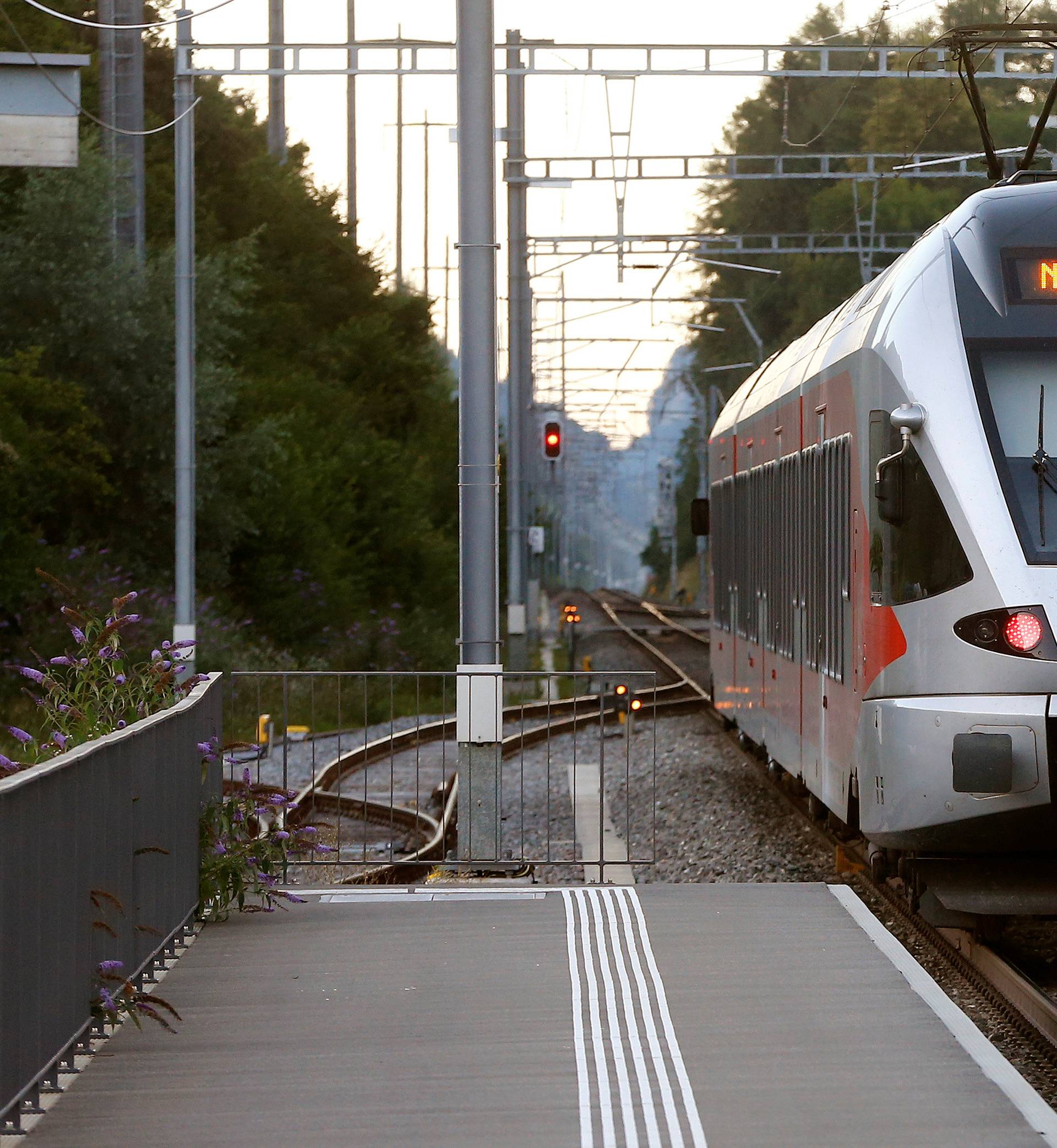 A display reading " Do not enter" is seen after a 27-year-old Swiss man's attack on a Swiss train at the railway station in Salez