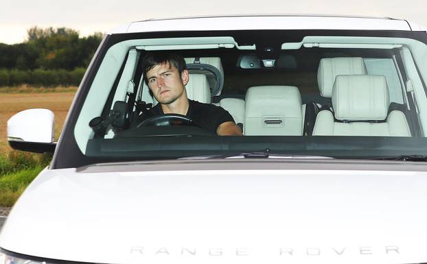 Manchester United players arrive for a training session - AON Carrington Training Complex