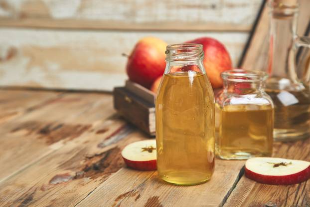 Apple cider vinegar. Bottle of apple organic vinegar