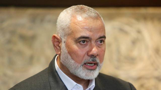 FILE PHOTO: Palestinian group Hamas' top leader, Ismail Haniyeh talks after meeting with Lebanese Parliament Speaker Nabih Berri in Beirut