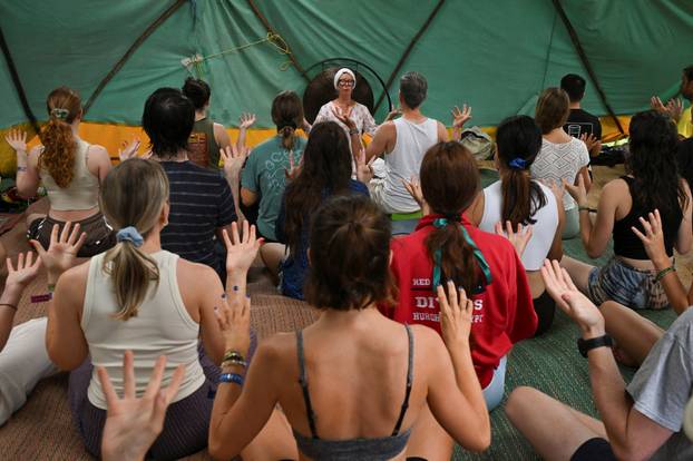Revellers attend Glastonbury Festival at Worthy Farm in Pilton