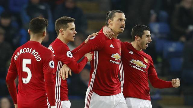Manchester United's Zlatan Ibrahimovic celebrates scoring their second goal with teammates