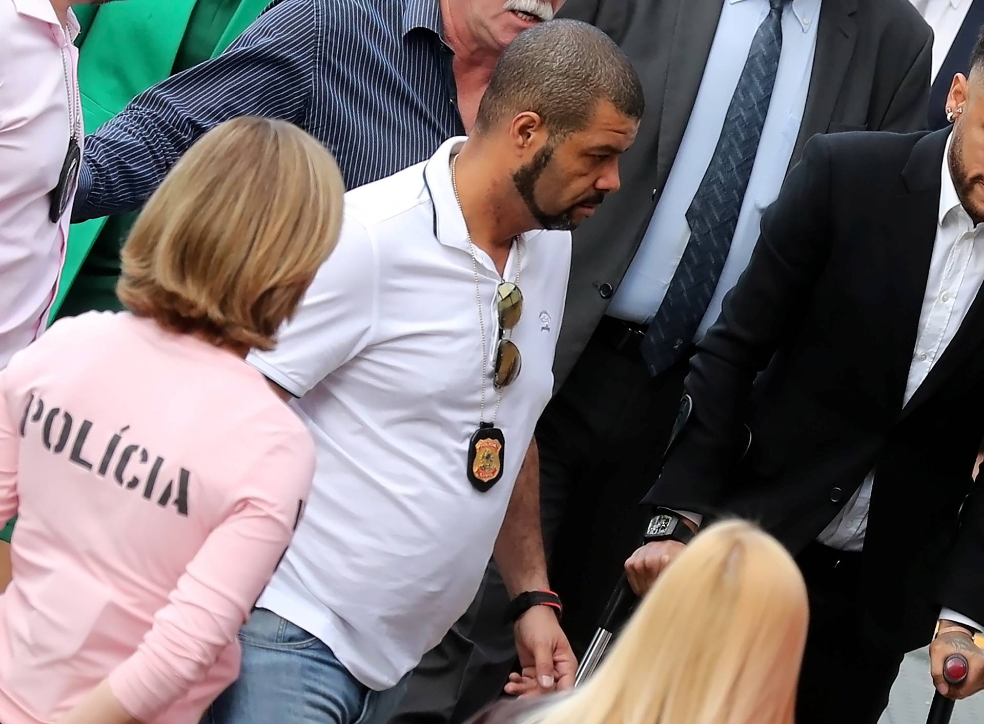 Brazilian soccer player Neymar arrives at a police station in Sao Paulo