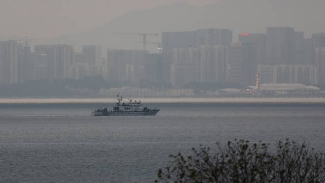 A fishing boat can be seen between Kinmen and Xiamen in China in Kinemn