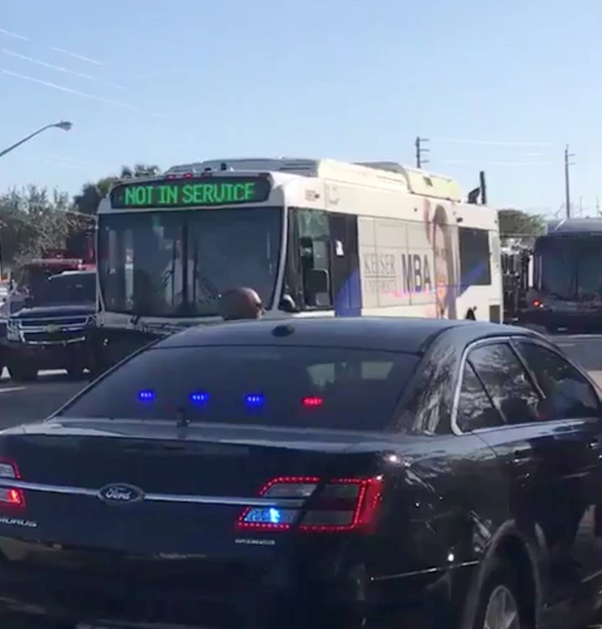 Buses show up to pick students from the Marjory Stoneman Douglas High School in Parkland where a shooting took place, in Coral Springs