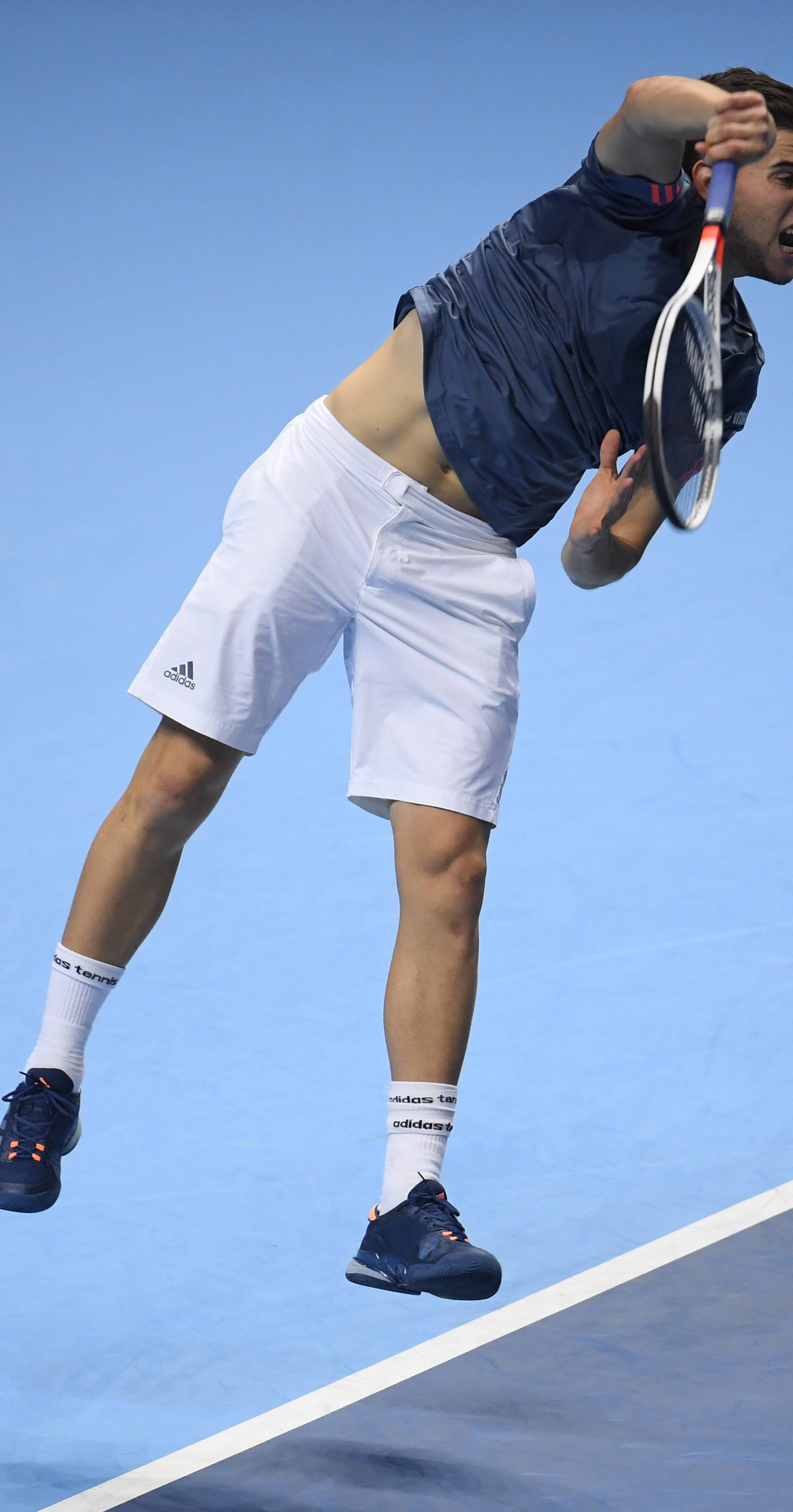 Austria's Dominic Thiem in action during his round robin match with Canada's Milos Raonic