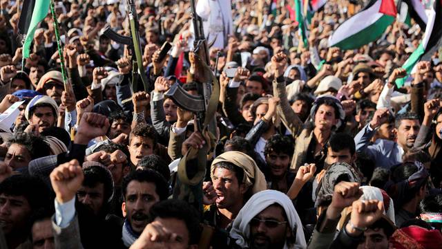 FILE PHOTO: Houthi supporters rally after U.S. and Britain carry out strikes against Houthis