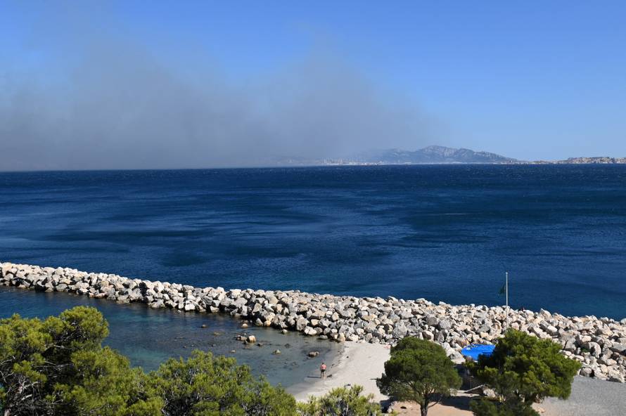 High winds fan wildfire in southern France near Marseille