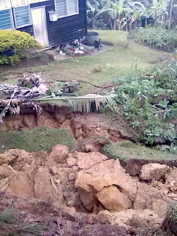 A damaged house is seen near a landslide in the town of Tari after an earthquake struck Papua New Guinea's Southern Highlands