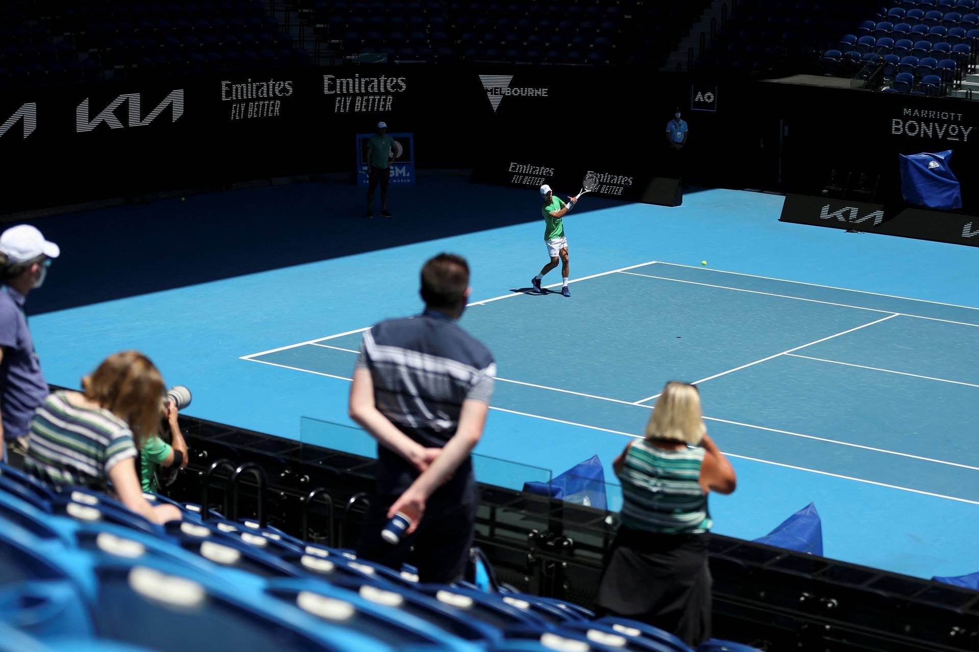 Serbian tennis player Novak Djokovic practices at Melbourne Park as questions remain over the legal battle regarding his visa to play in the Australian Open