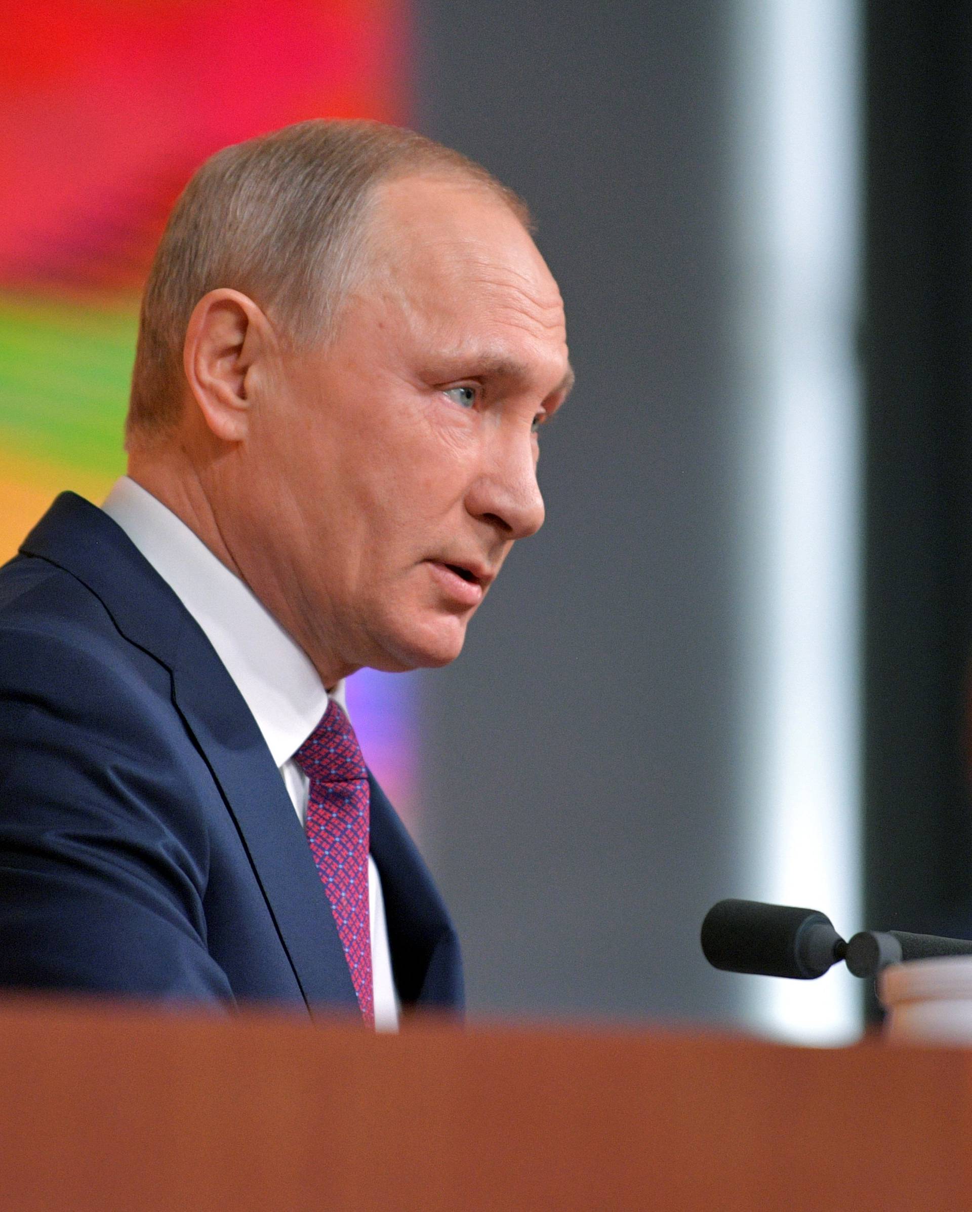 Russian President Vladimir Putin speaks during his annual end-of-year news conference in Moscow