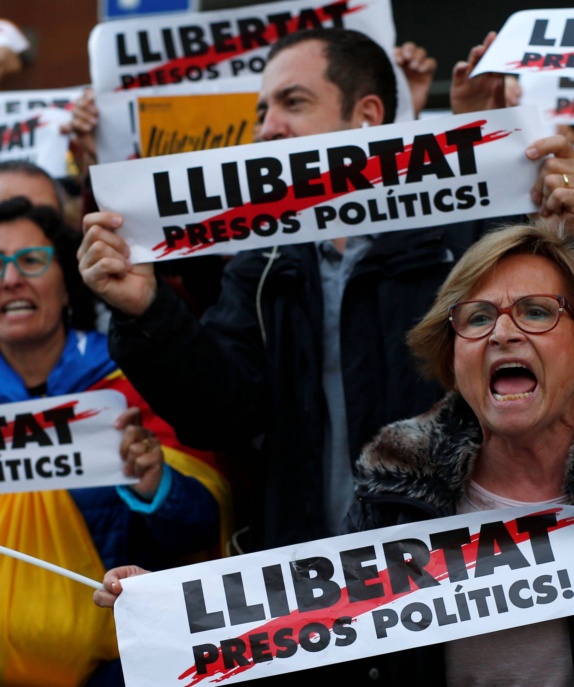 Protesters take part in a demonstration called by pro-independence asociations asking for the release of jailed Catalan activists and leaders, in Barcelona