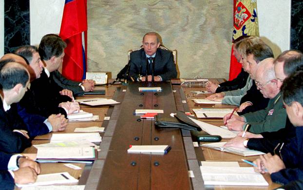 FILE PHOTO: Putin speaks to his ministers during government meeting in Kremlin, Moscow
