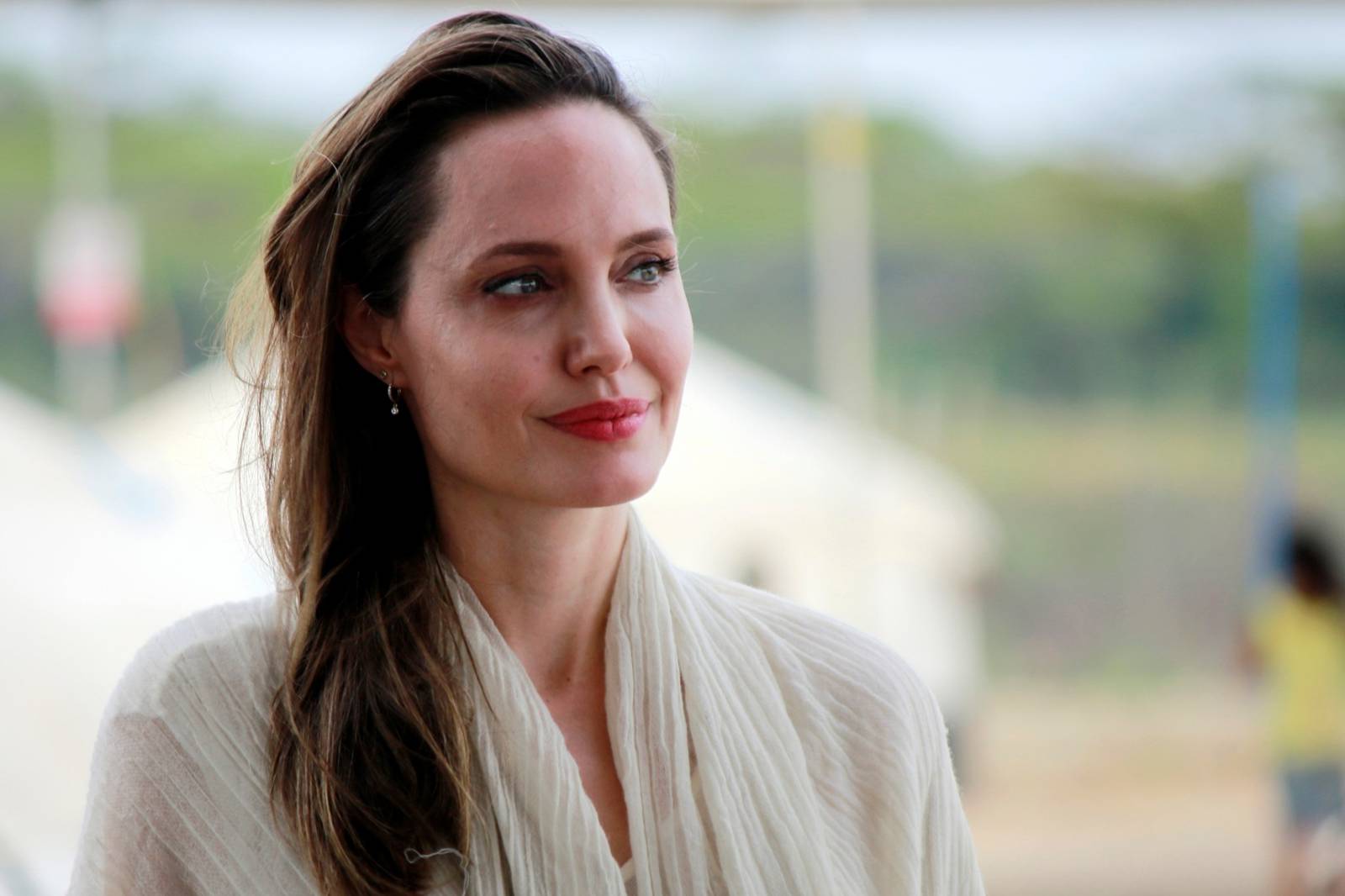 UN Refugee Agency's special envoy Angelina Jolie reacts during a news conference in a camp run by the UNHCR in Maicao