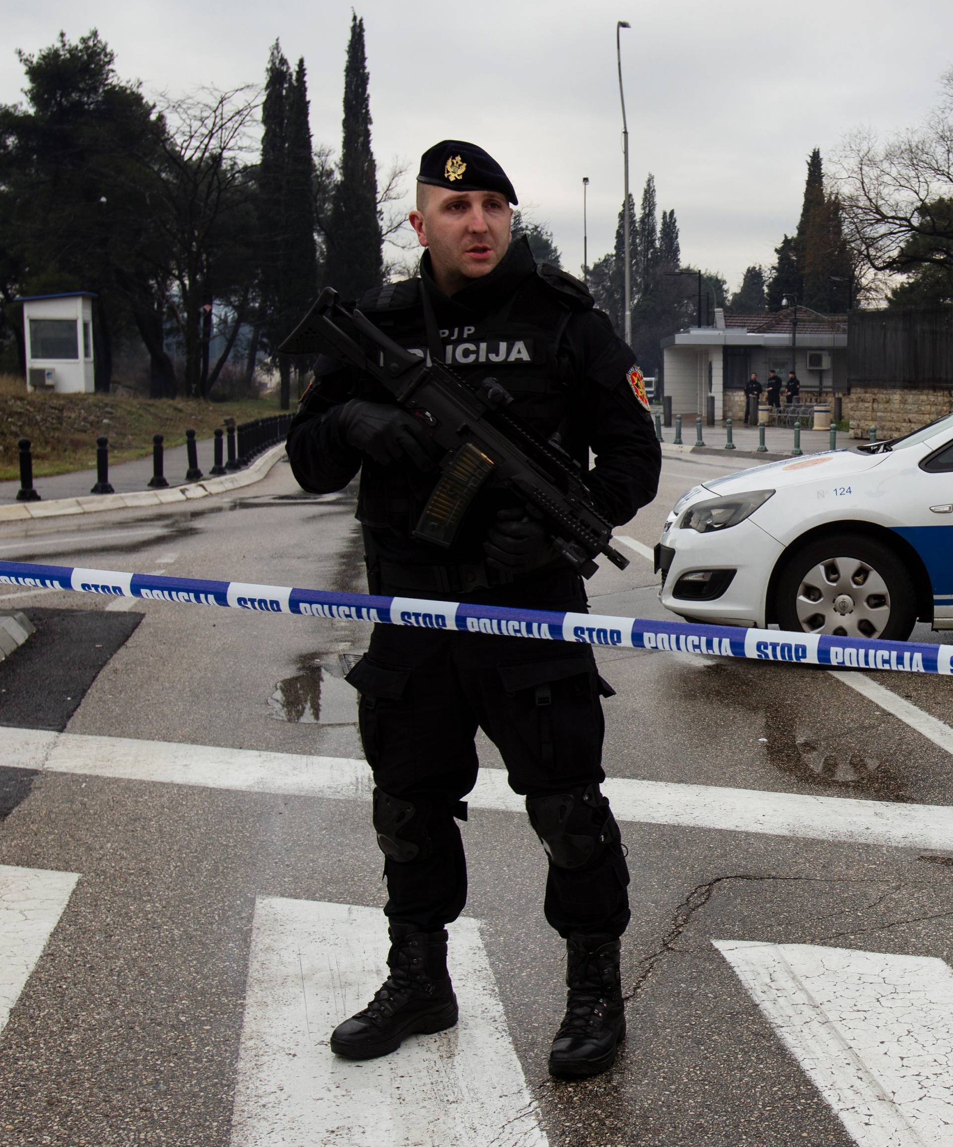 Police guard the United States embassy building in Podgorica