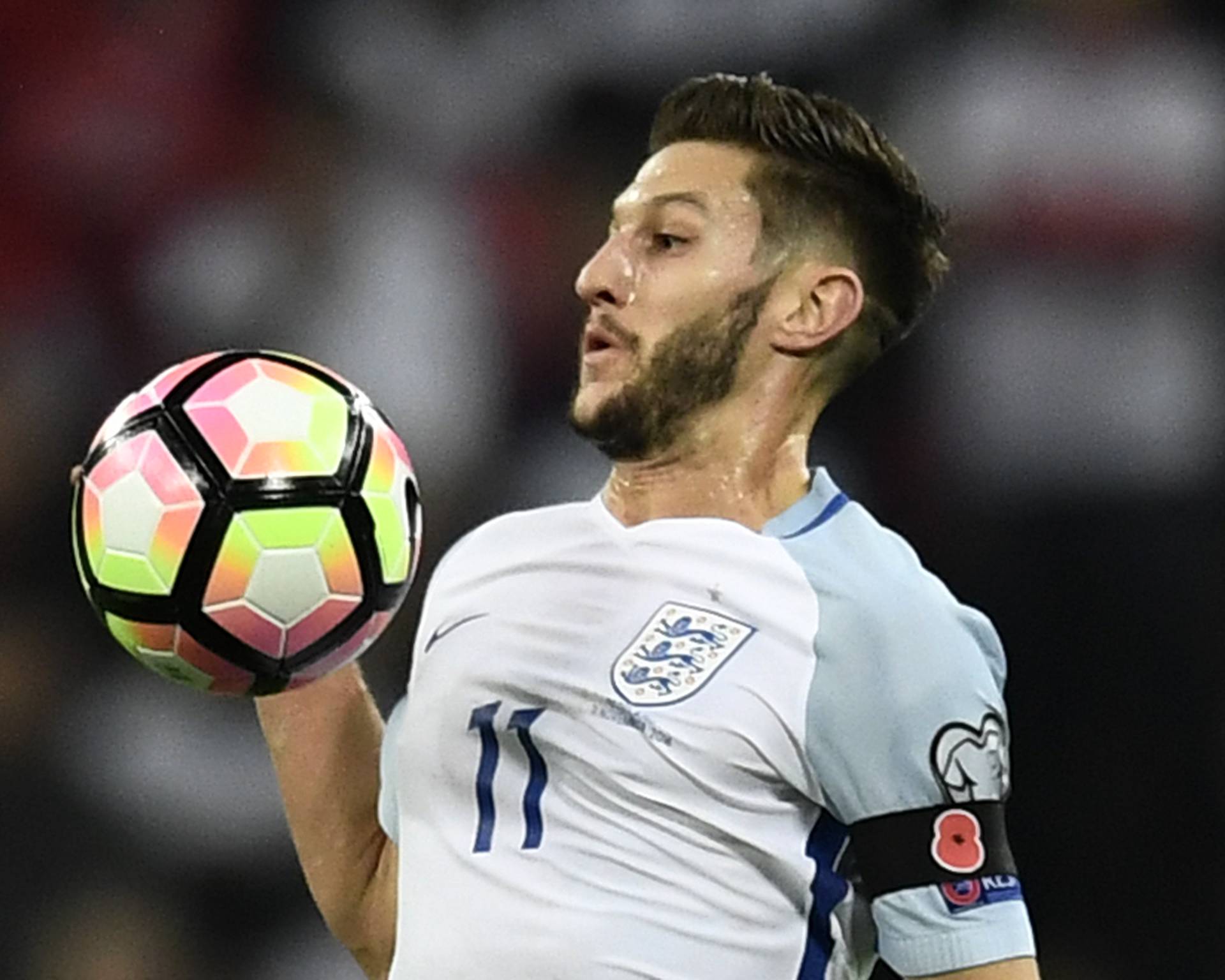 England's Adam Lallana in action