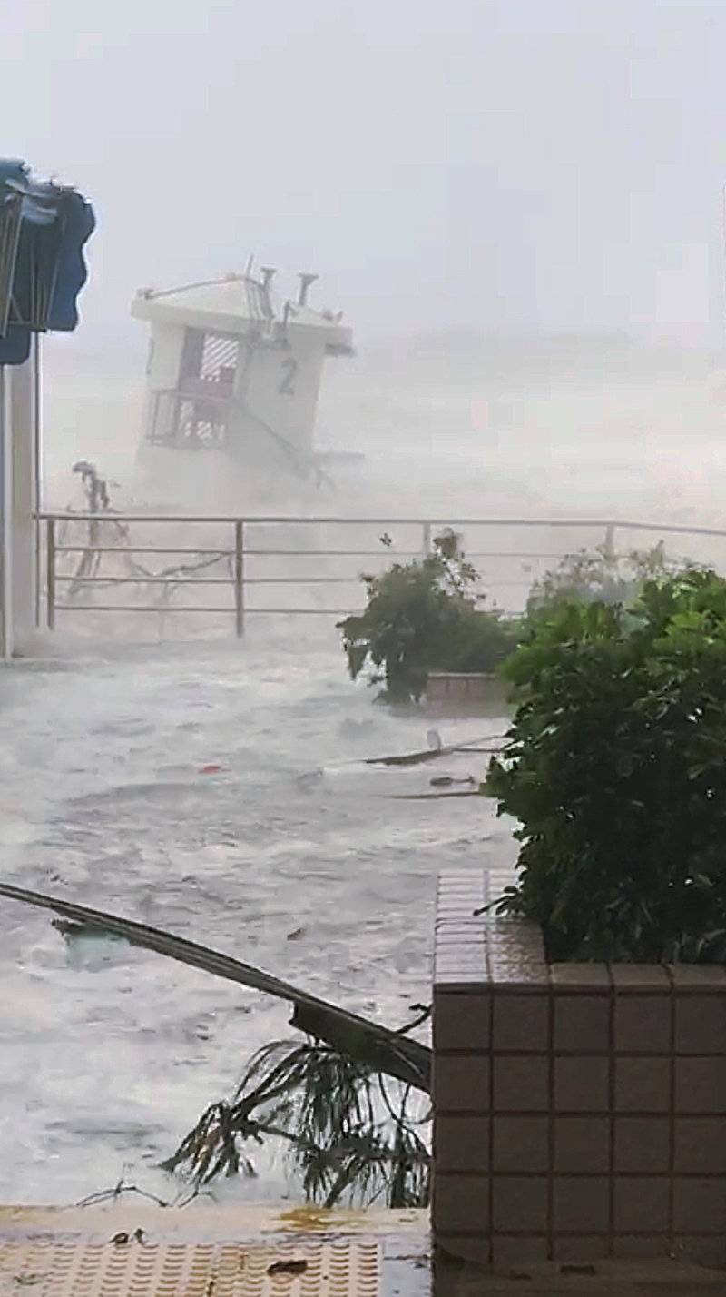 Waves crashes on the beach during Typhoon Mangkhut in Hong Kong