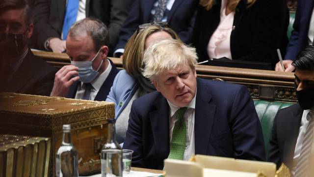 FILE PHOTO: British PM Johnson speaks during the weekly question time debate at Parliament in London