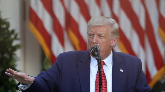 U.S. President Donald Trump attends a news conference in the Rose Garden at the White House in Washington