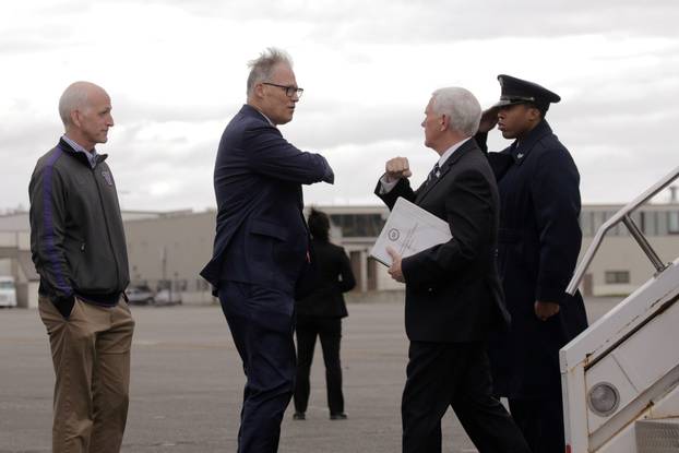 Governor Inslee greets U.S. Vice President Pence who heads the government