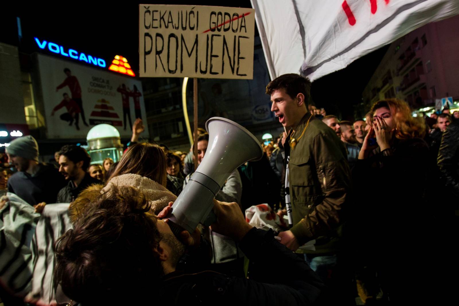 Demonstrators shout slogans during civic protest in Podgorica