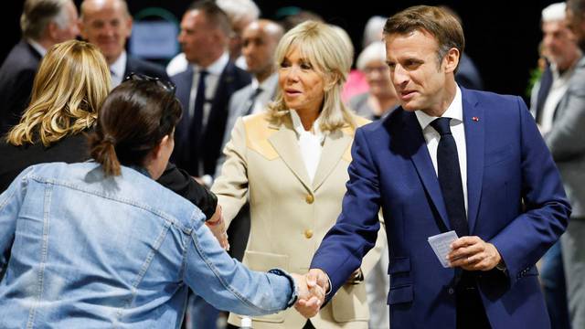 French President Macron votes in the first round of French parliamentary elections