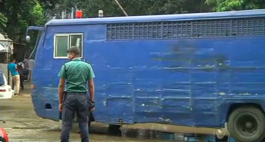Still frame from video shows a prison van along a street as police stormed the Holey Artisan restaurant after gunmen attacked it and took hostages early on Saturday in Dhaka