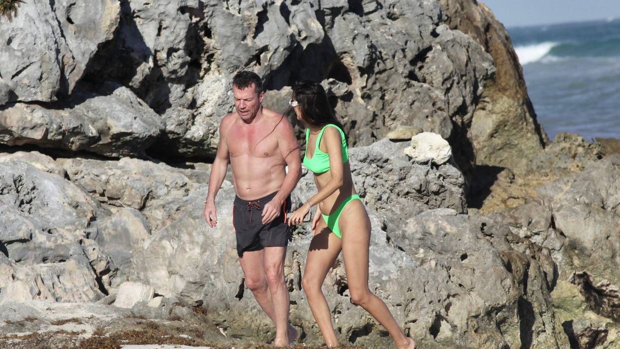 EXCLUSIVE: Soccer legend Lothar Matthäus is pictured on vacation in Mexico with a stunning brunette